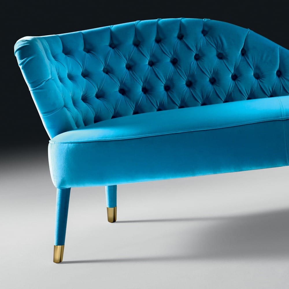 turquoise velvet button upholstered chaise longue close up