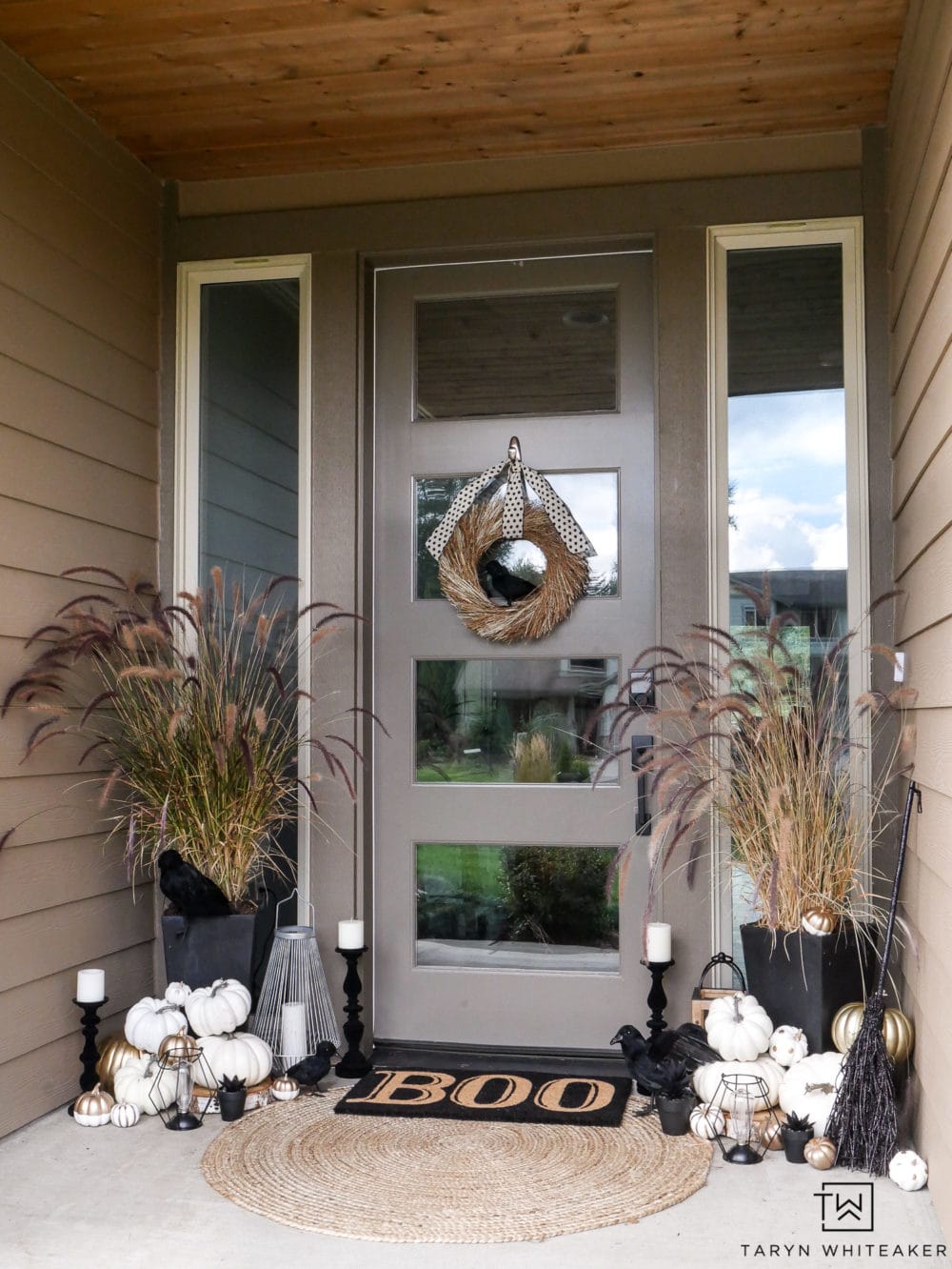 Halloween decor, porch decorated for Halloween in black, white and gold