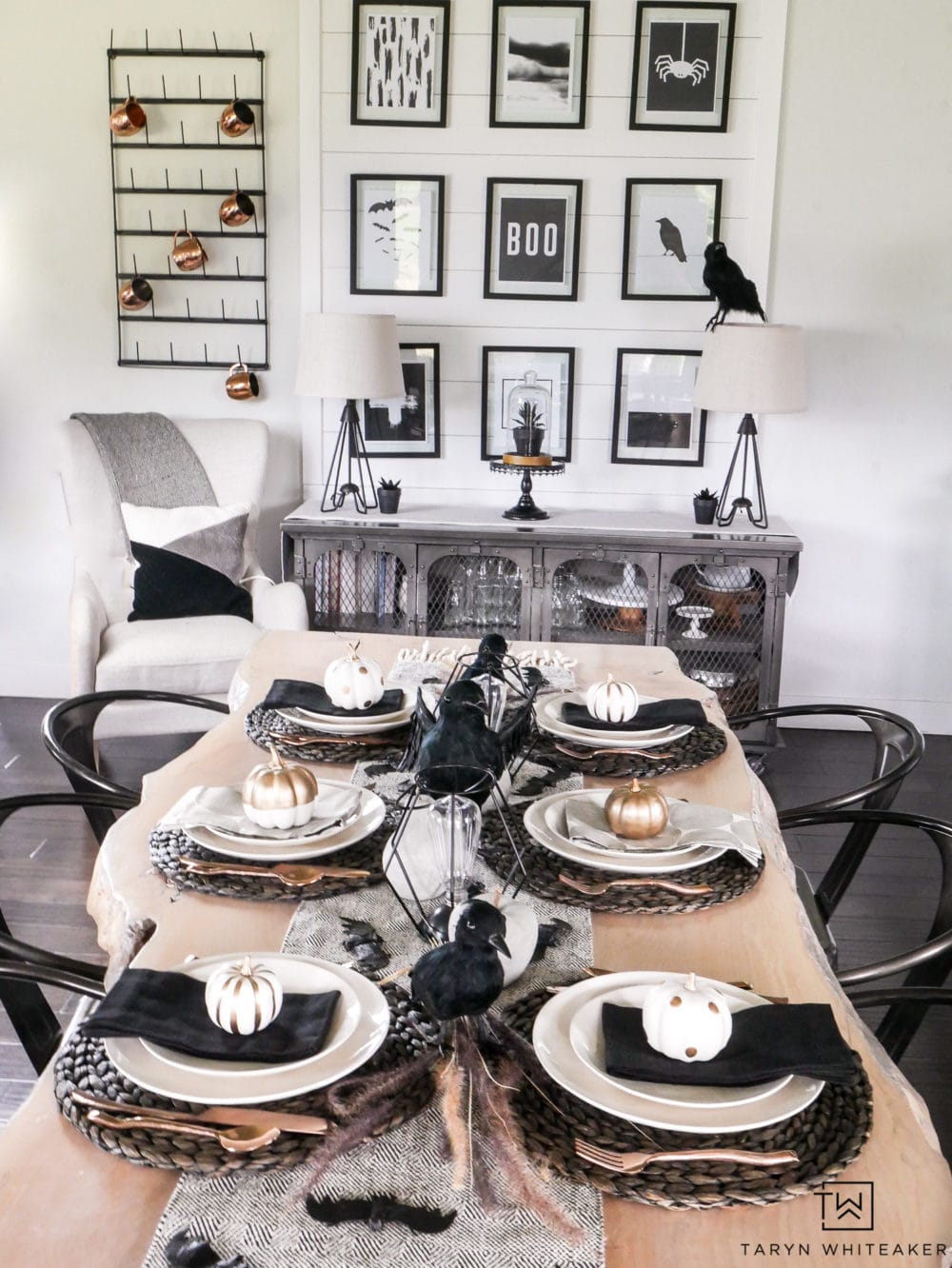 Halloween Home, table decorated in black and white with pumpkins, crows, black accessories