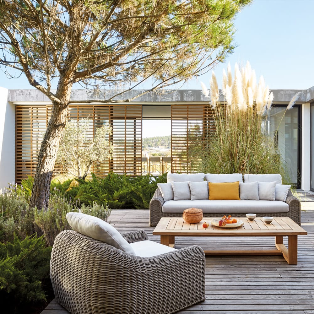 outdoor furniture, luxury wicker sofa and chair on decking