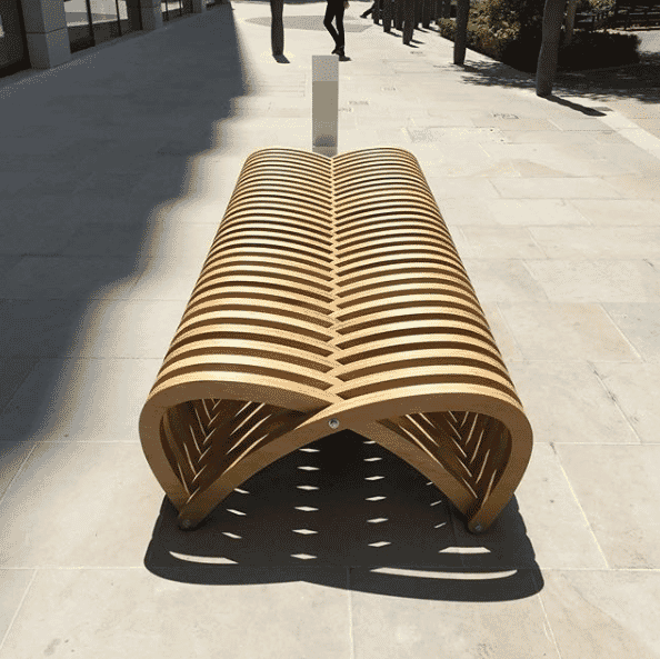 Double Bench curved wood bench by Mills Turner Architects