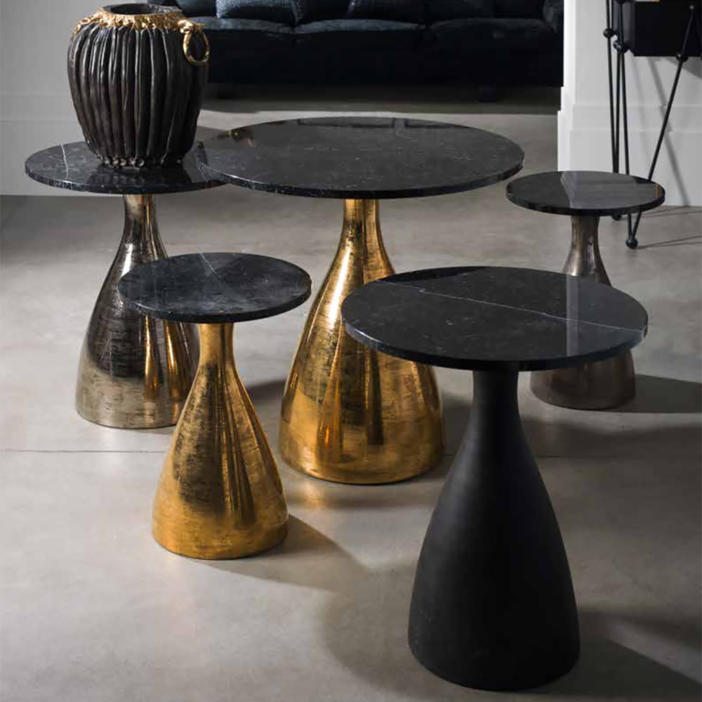 black marble side table aged metallic base meet the designers