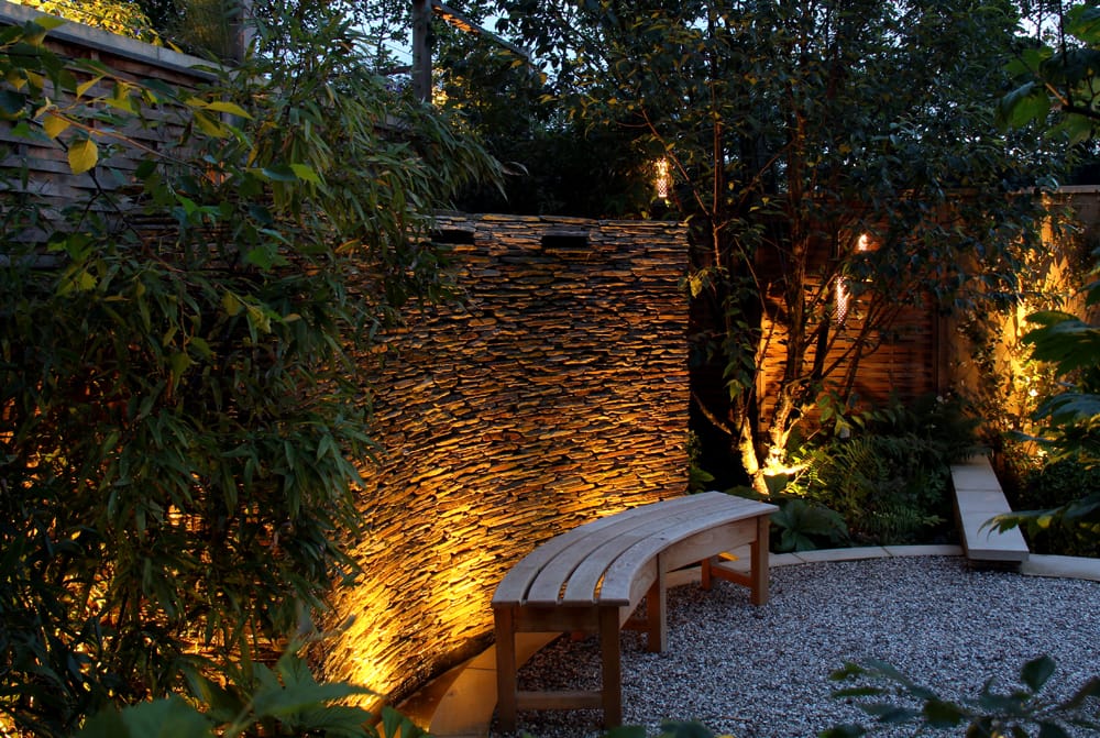 uplighters in courtyard garden trends 2018