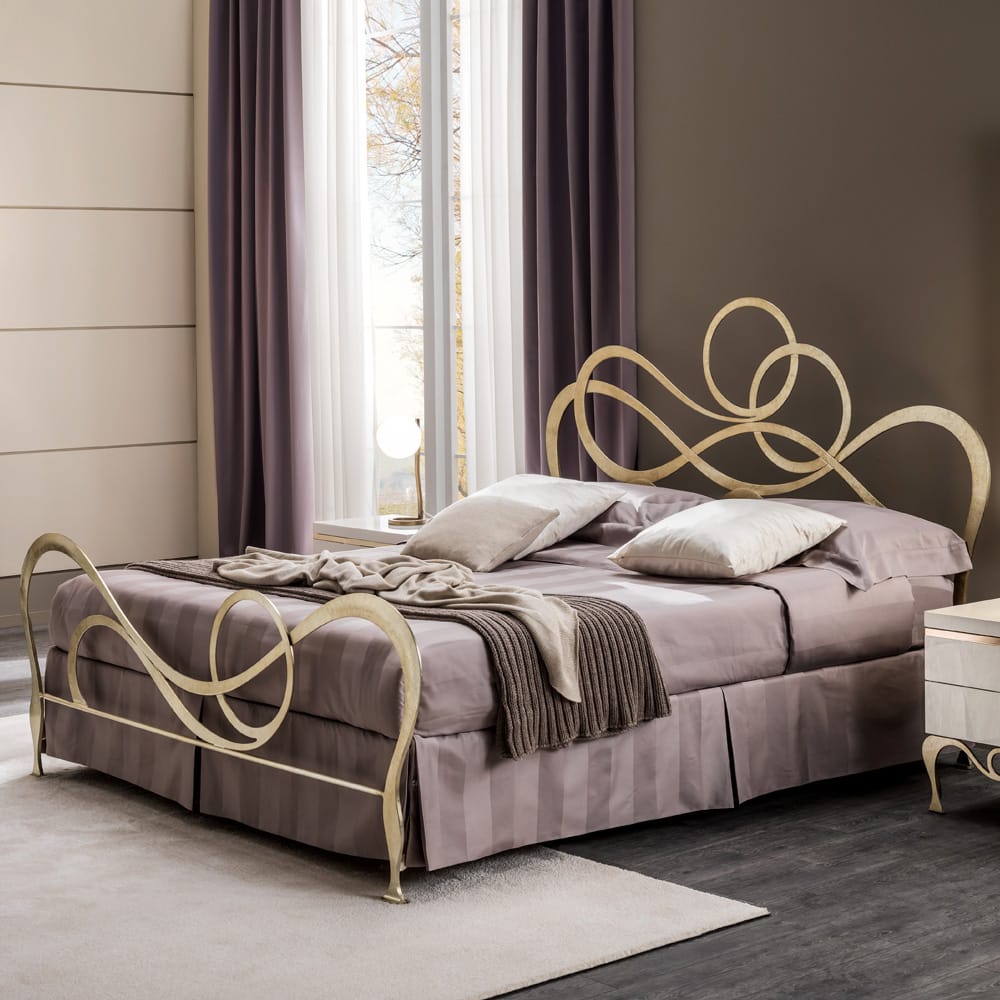 Chelsea Collection, ornate bed with swirly headboard and footboard, champagne leaf finish