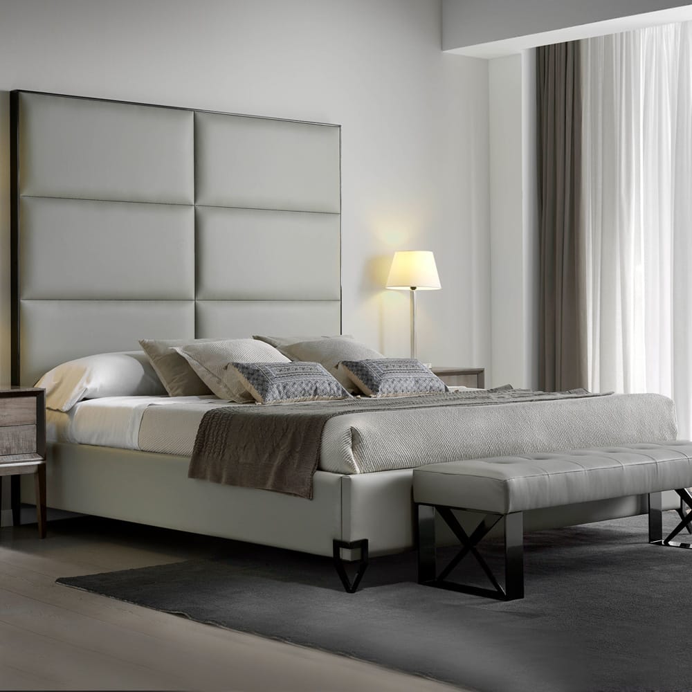 Contemporary bed, upholstered in ivory leather with tall, 6-panelled leather headboard, autumn arrivals