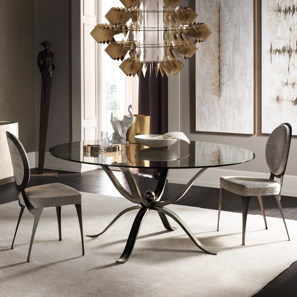 Impress the guests, round smoked glass dining table with brushed bronze legs