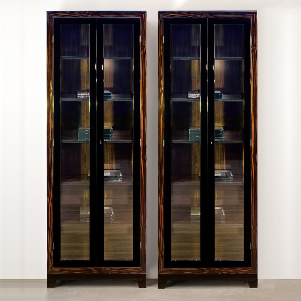 2 glass fronted display cabinets, dark wood surround