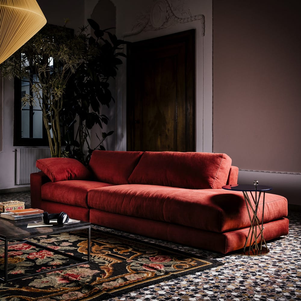 Impress the guests, modern red linen sofa with extended chaise-style end