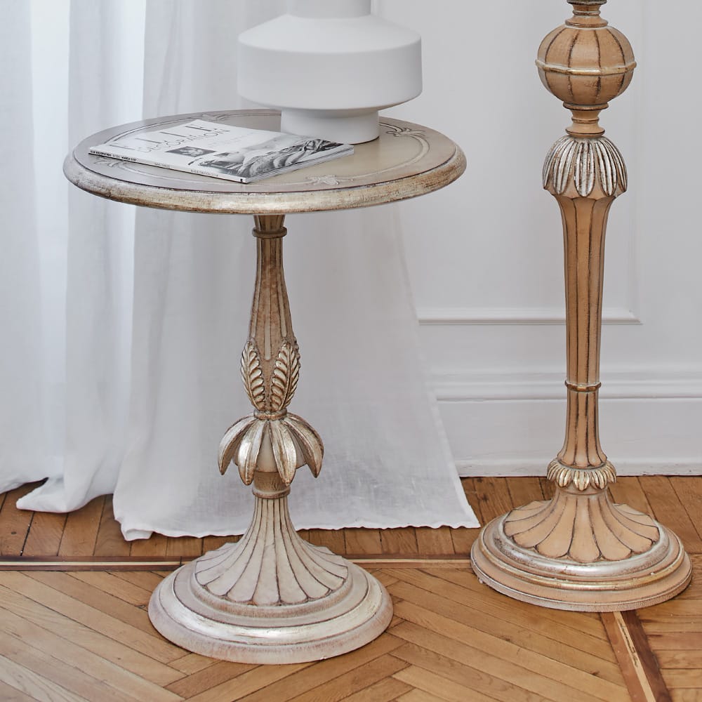 Impress the guests, ornate, carved side table with leaf design and pale gold finish