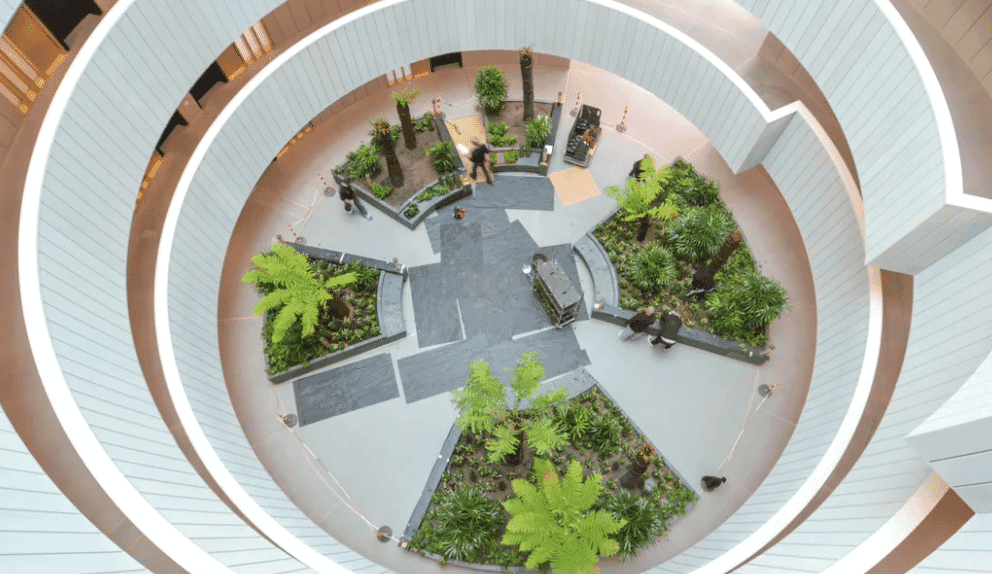 Gasholders atrium with planting in centre of residential drum RIBA Awards 2018