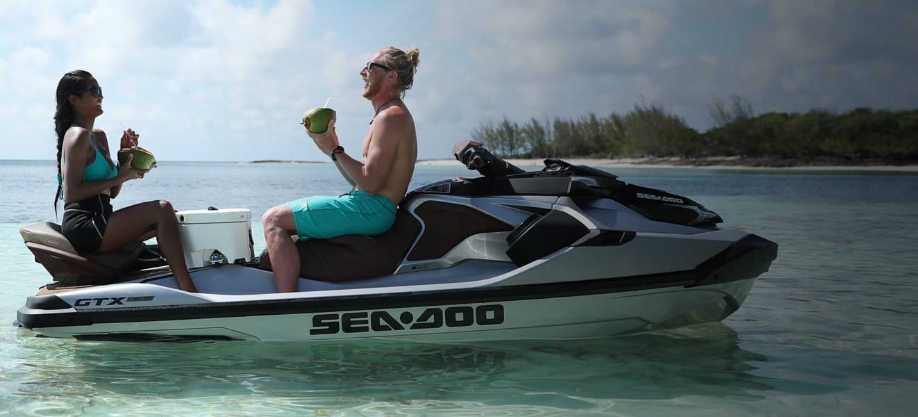 Yacht toys, 2 people having a picnic on the back of a Sea-doo