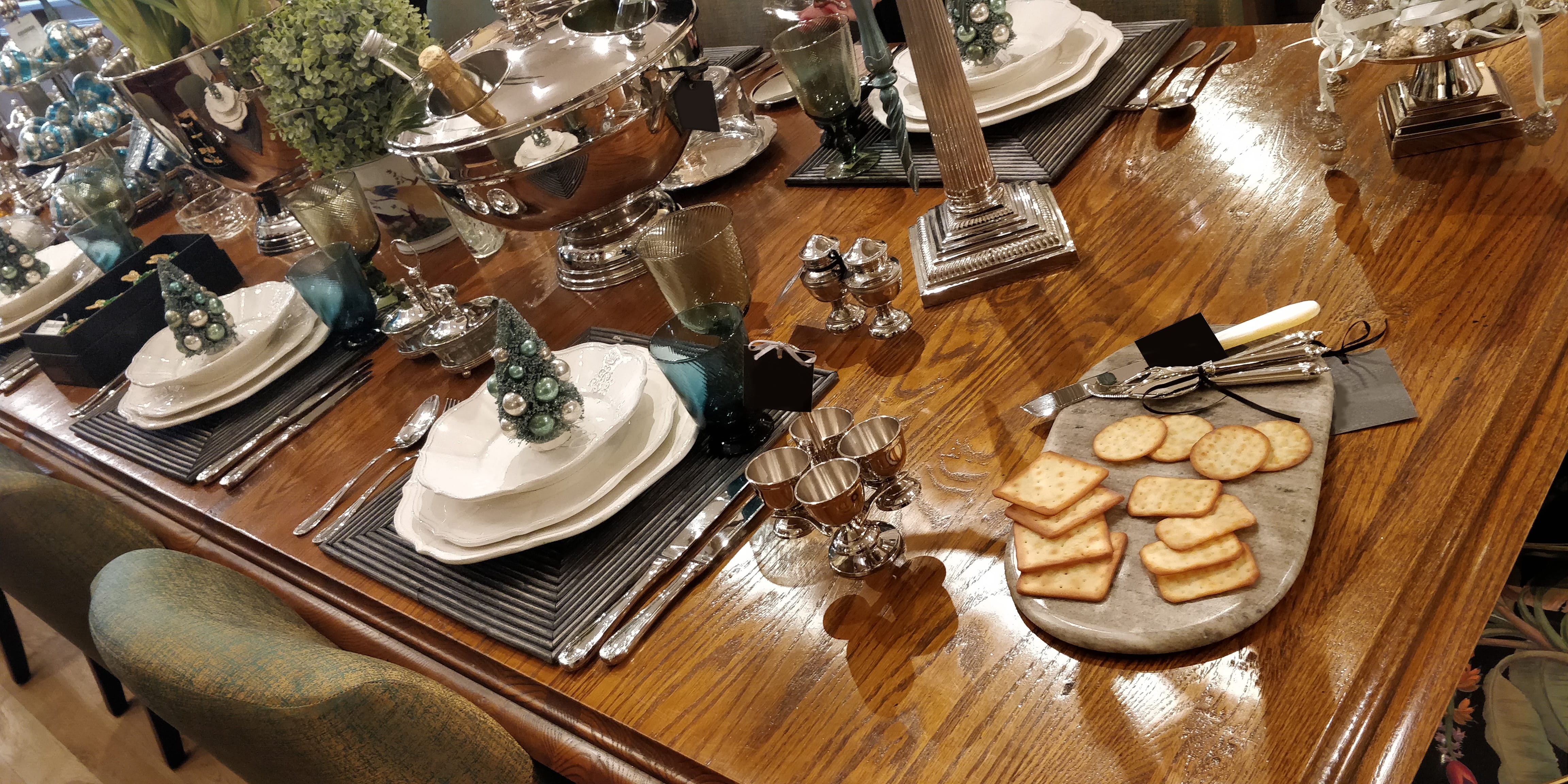 Christmas all wrapped up, elegant Christmas table setting, cheese board, decorations