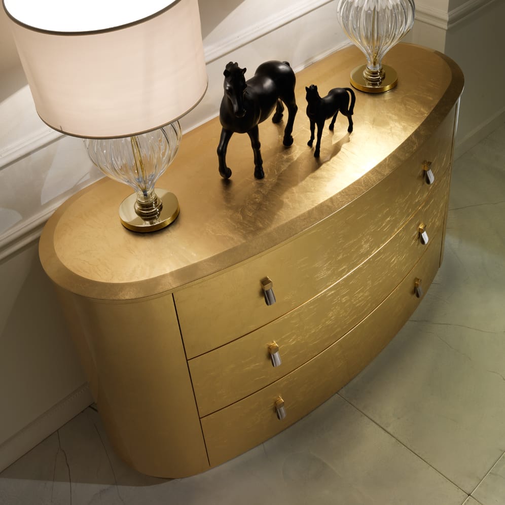 set-the-atmosphere-gold-oval-chest-of-drawers