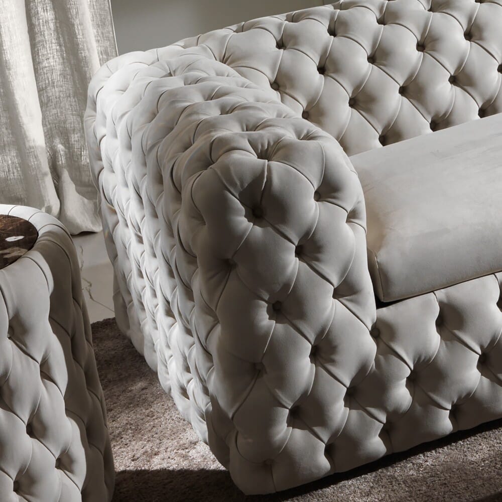 interior design trends 2020, deep buttoned cream leather armchair