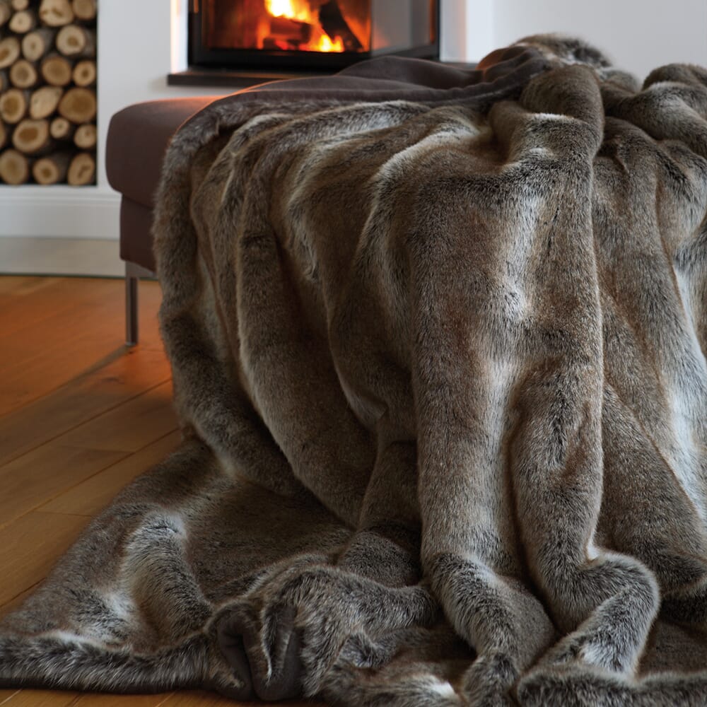 interior design trends 2020, luxurious brown faux fur throw