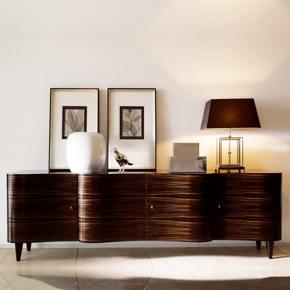 interior design trends 2020, dark, macassar wood sideboard with wave front