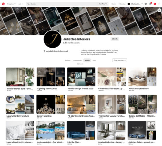 A Pinterest homepage for Juliette's Interiors featuring various themed boards. The profile includes a black and gold logo and a description of the company as a luxury realtor and high-end furnishing showroom. Different boards showcase interior design trends, lighting, and furniture.