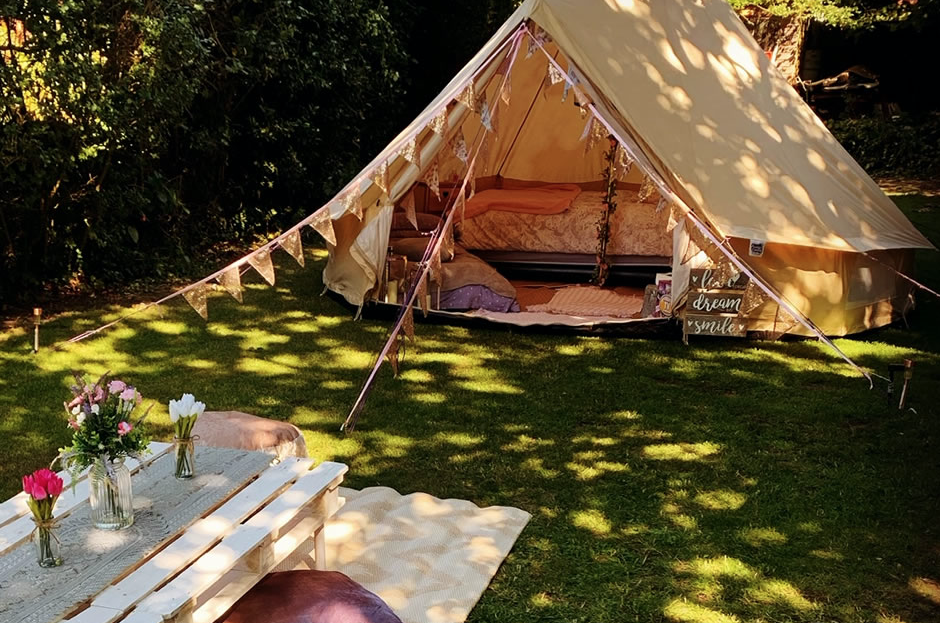 luxury staycations, glamping bell tent in a garden