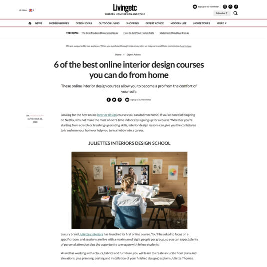 Screenshot of an article on Livingetc titled "6 of the best online interior design courses you can do from home." The focus is on Julien's Interiors Design School with an image of a woman sitting at a desk working on a computer with a plant and shelves behind her.