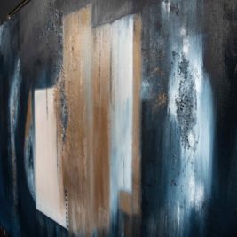 Abstract painting featuring a blend of dark blue, white, and brown tones. The composition includes vertical stripes, textured patches, and layered brush strokes that add personality, creating depth and contrast against a primarily dark background.