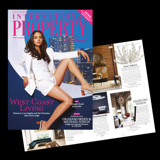 The image shows the cover of International Property luxury magazine featuring a woman in a white outfit sitting. The title reads "West Coast Living." Next to it, there's a spread of pages displaying elegant interior design and property listings.