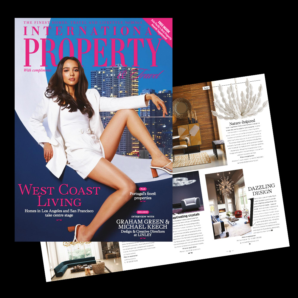 The image shows the cover of International Property luxury magazine featuring a woman in a white outfit sitting. The title reads 