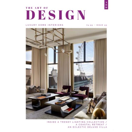 A magazine cover titled "The Art of Design," featuring a luxurious, contemporary living room with floor-to-ceiling windows, modern furniture, and stylish lighting. Issue 55 of *The Art Of Design* focuses on luxury home interiors and highlights trendy lighting, coastal retreats, and deluxe villas.