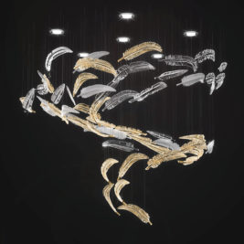 A modern chandelier with a dark background is composed of numerous delicate, feather-like elements. These elements, in gold and transparent materials, appear to be suspended mid-air, creating an elegant and whimsical appearance. This sculptural lighting instantly transforms your home.