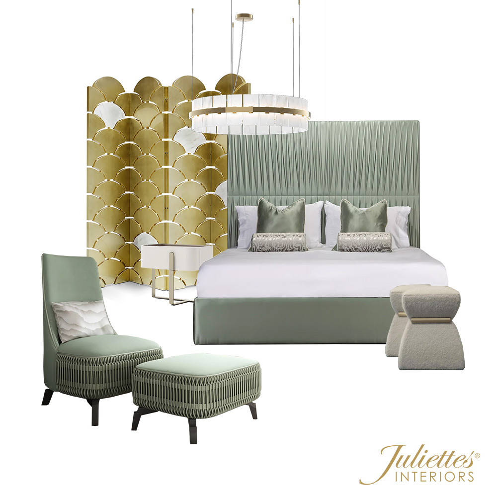 A stylish bedroom reminiscent of the grandest rooms of Queen Elizabeth features a green upholstered bed with white and green bedding, flanked by modern nightstands. Decorative pillows adorn the bed. A green chair with a matching ottoman, a two-tier chandelier, gold room divider, and plush stools complete the decor. "Juliettes Interiors" logo is at the bottom right.