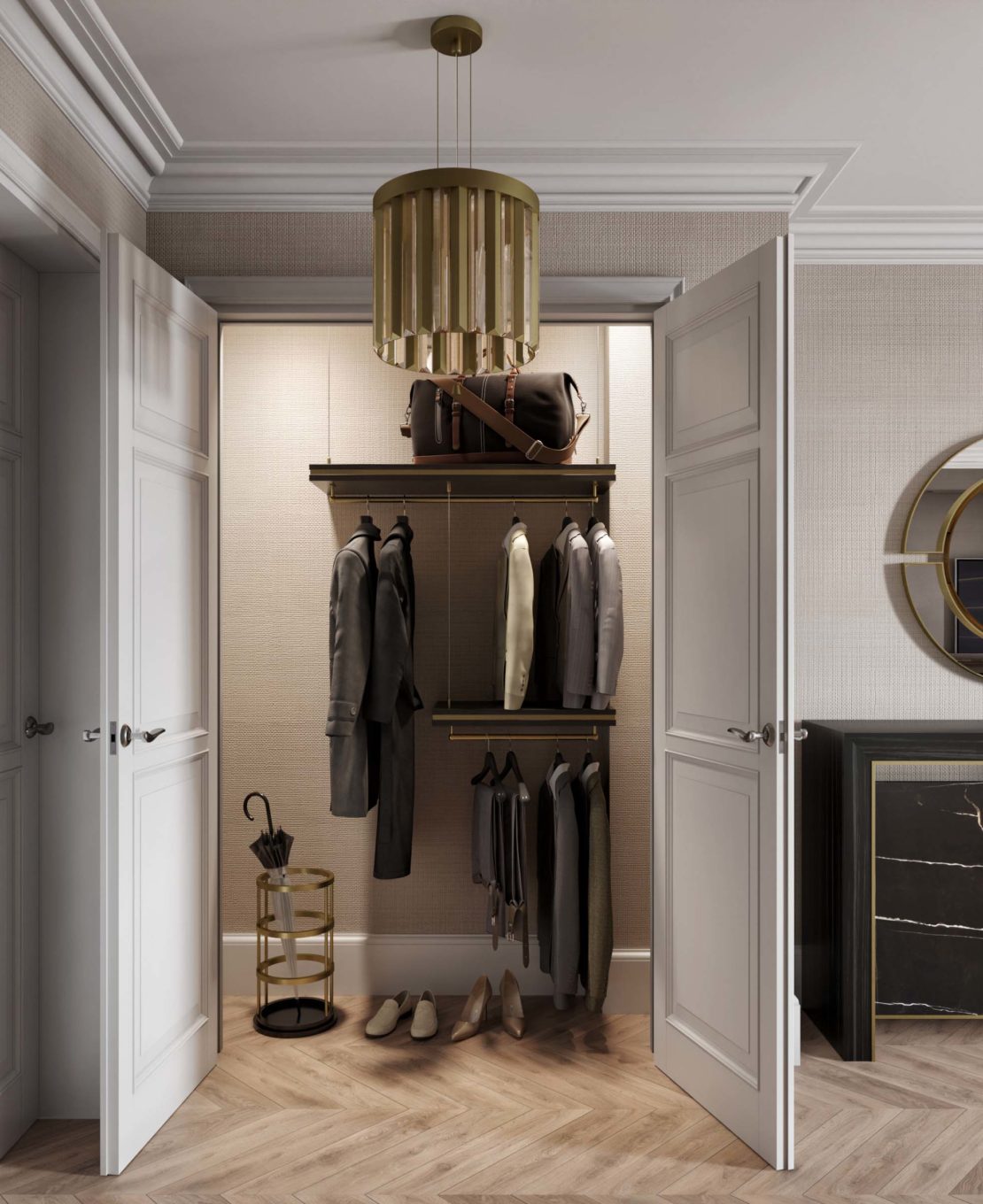 A stylish, open closet in a gentleman's luxury home office with double doors contains neatly hung suits, shirts, and pants. A shelf at the top holds bags, and the bottom has shoes lined up. A modern gold chandelier hangs above, and an umbrella stand with umbrellas is on the floor to the left.