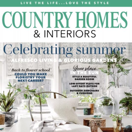 Cover of Country Homes magazine featuring an article about garden armchairs