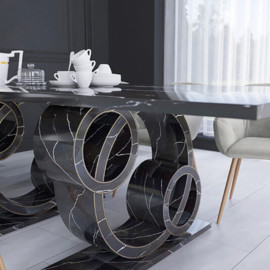 Exclusive Rectangular Marble Dining Table A modern dining room with an Exclusive Rectangular Marble Dining Table featuring unique circular legs. The tabletop is set with white cups, saucers, and a teapot. The room boasts white tile flooring, sheer curtains, and a light-colored cushioned chair in the background.