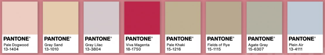 A row of seven Pantone color swatches on a pale pink background. Colors include Pale Dogwood, Gray Sand, Gray Lilac, Viva Magenta, Pale Khaki, Fields of Rye, and Agate Gray. Each swatch has the color name and number along with the Pantone® logo at the bottom.

