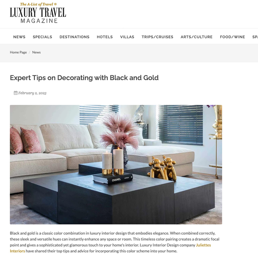 A webpage from Luxury Travel Magazine features an article titled "Expert Tips on Decorating with Black and Gold," published on February 3, 2023. The image showcases a modern black coffee table with gold accents, elegantly decorated with books, candles, and vases.