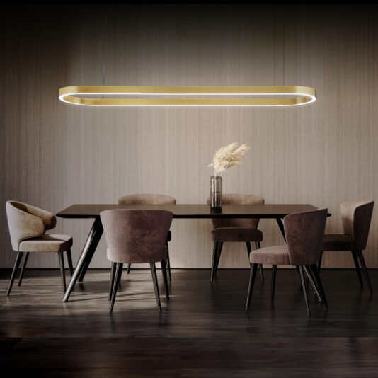 A modern dining room features a dark wooden table surrounded by six cushioned chairs in varying shades of beige and brown. Above the table hangs the Contemporary Oval Downlight Chandelier. A glass vase with pampas grass sits as a centerpiece on the table.