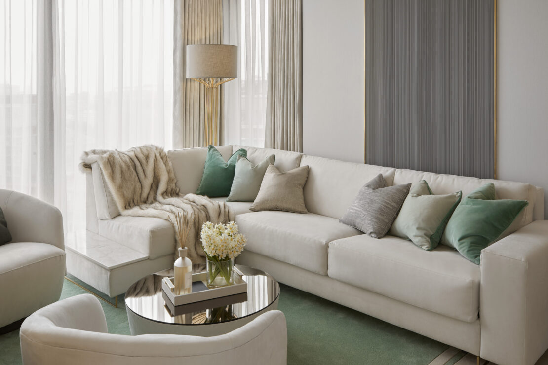 Bespoke corner sofa that is also a pull out bed in luxury apartment Battersea London designed by Juliettes Interiors