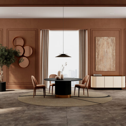 Round Contemporary Stone Effect Dining Table Modern dining room with brown walls, a Round Contemporary Marble Effect Dining Table, four brown chairs, minimalist pendant light, large window with beige curtains, wall art, sideboard, decorative vases, potted tree on a circular rug.