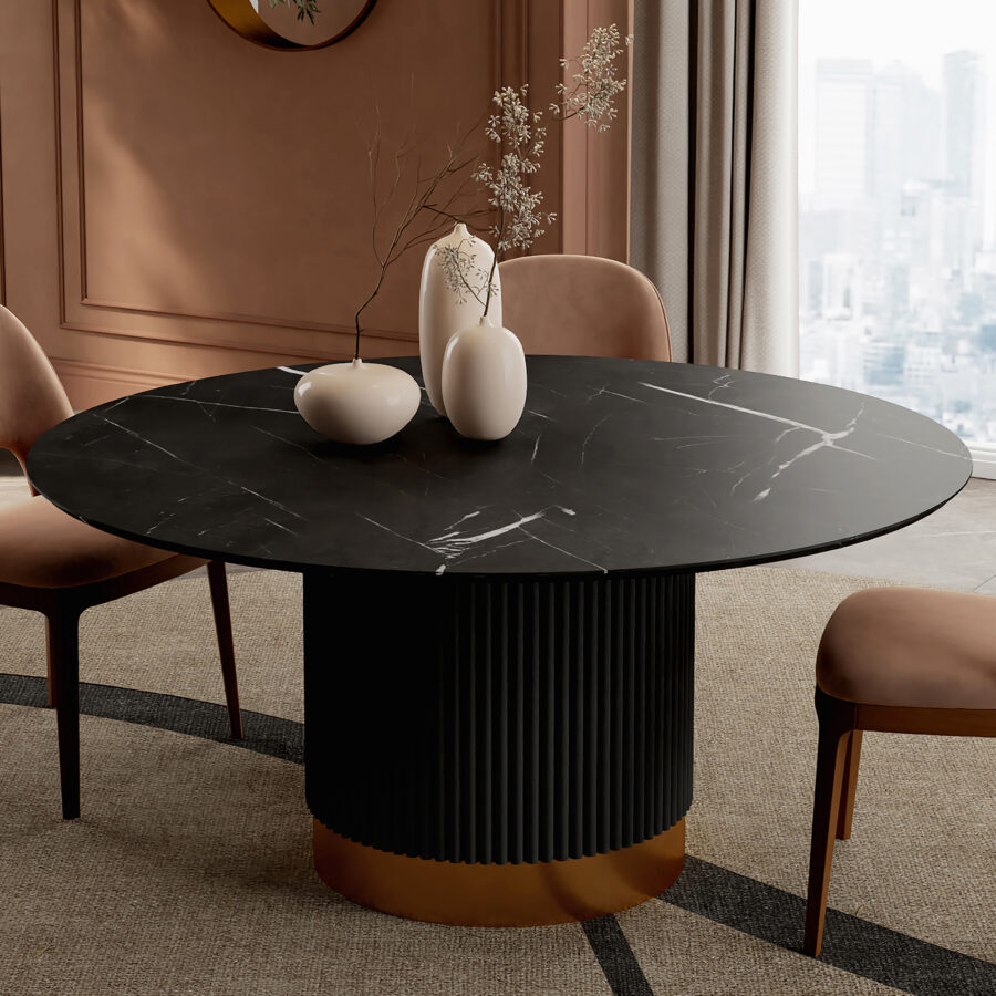 Round dining table with a dark, veined ceramic stone-effect top