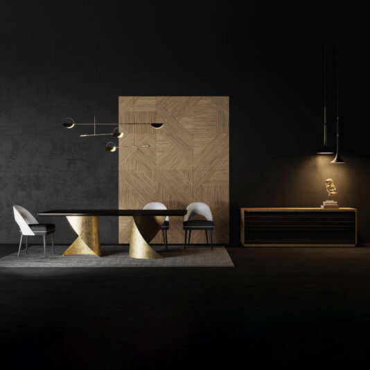 Contemporary Ebony Veneered Dining Table A modern dining room features the Contemporary Ebony Veneered Dining Table with gold geometric bases, three white chairs, a wooden accent wall, pendant lighting, and a sideboard with decor set against dark walls.