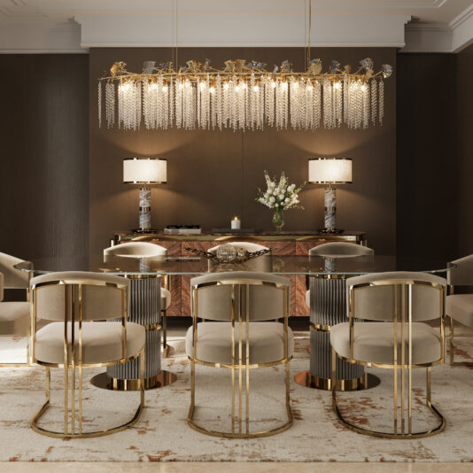 A luxurious dining room features the Contemporary Oval Glass Dining Table, eight gold and beige chairs, a modern crystal-accented chandelier, two table lamps, a wooden sideboard, and a vase of white flowers against dark brown walls.