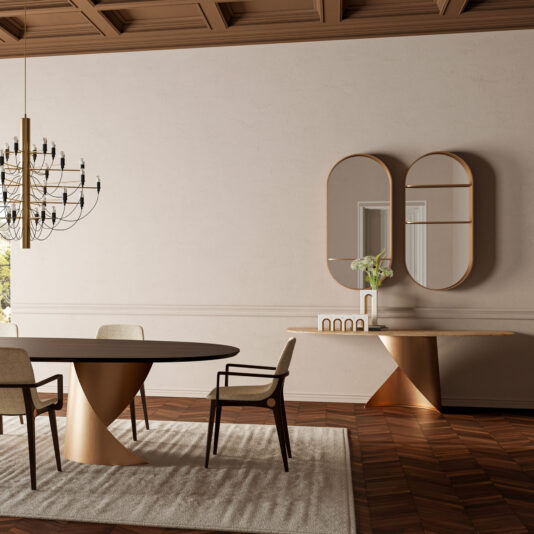 Contemporary Pill Wall Mirror A modern dining room with a round table and gold base, four chairs, a light rug, chandelier, Modern Marble Console Table with vases, two oval mirrors on a beige wall, wooden floors, and coffered ceiling.
