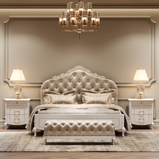 A luxurious bedroom showcases the Button Upholstered Bed With Ornate Carvings, a matching bench, elegant bedding, two bedside tables with gold lamps, a plush rug, and a gold chandelier in soft beige and gold tones.